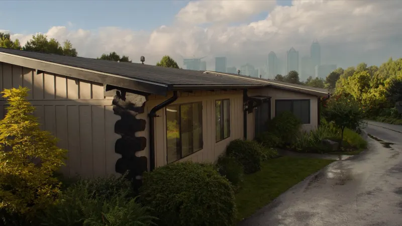 Intown Atlanta craftsman home with black seamless gutters and the downtown skyline in the distance — Atlanta, GA