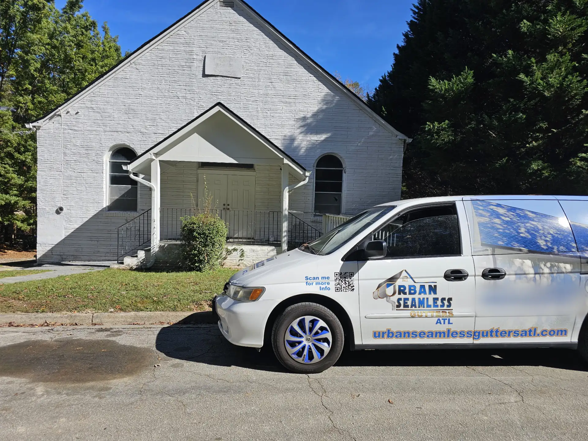 Urban Seamless Gutters ATL service van arriving to install micro-mesh gutter guards at an Atlanta property