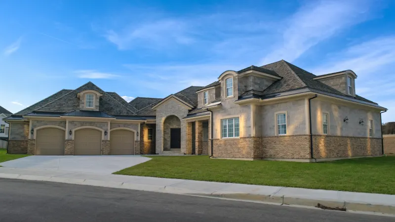 New-construction Forsyth County estate with a complete matte black seamless gutter system — Cumming, GA