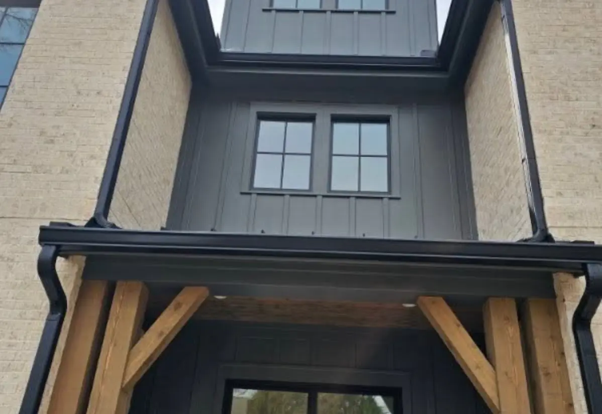 Black seamless gutter install on a Stone Mountain, GA home in DeKalb County